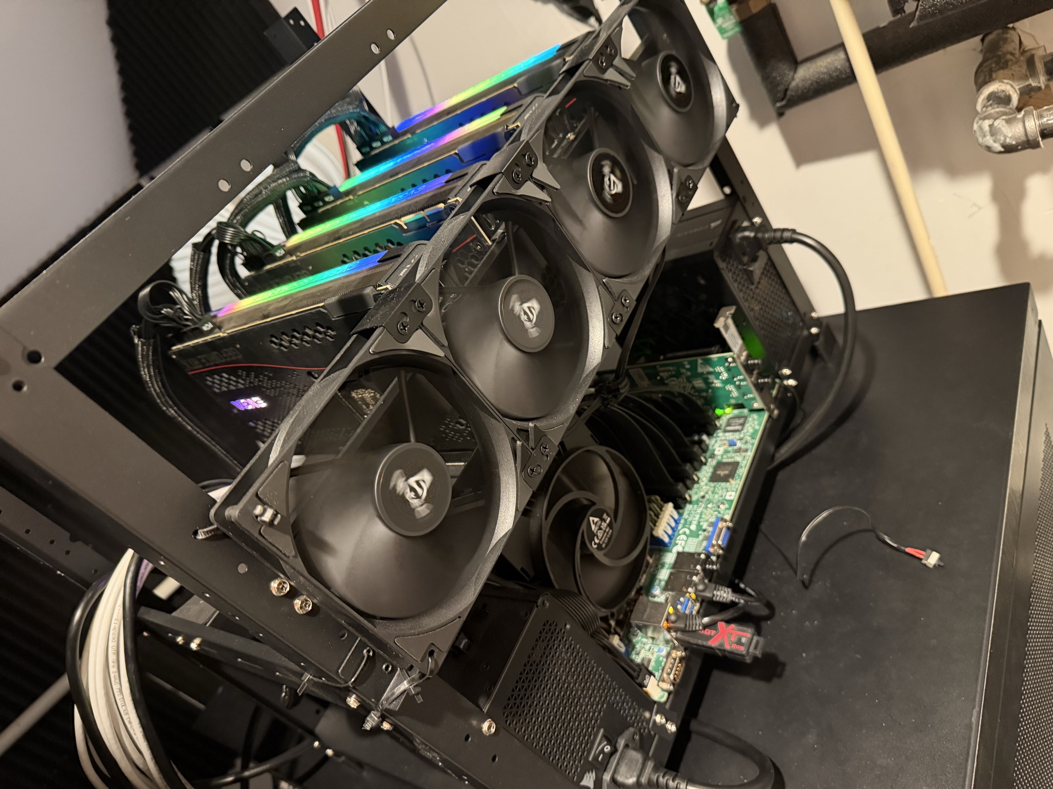 The four-GPU rig on its open-air frame